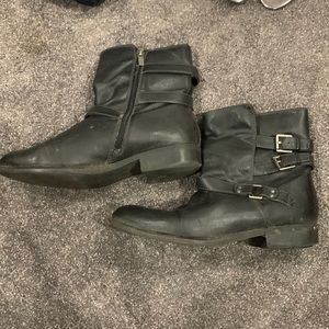 Black boots, leather, size ten. Heavily worn, but still have some life.